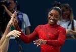 Biles wins 3rd gold; cyclist Evenepoel wins historic double