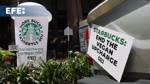 Activistas se manifiestan disfrazados de vaca ante un local de Starbucks en Malasia
