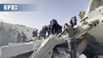 Palestinians search for missing under rubble after Israeli airstrike leaves at least 14 dead