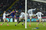 Lewandowski hat-trick hands Barca win against 10-man Valencia